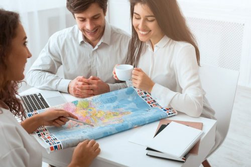 Plan,Journey.,Happy,Couple,Choosing,Place,For,Vacation,Using,Map